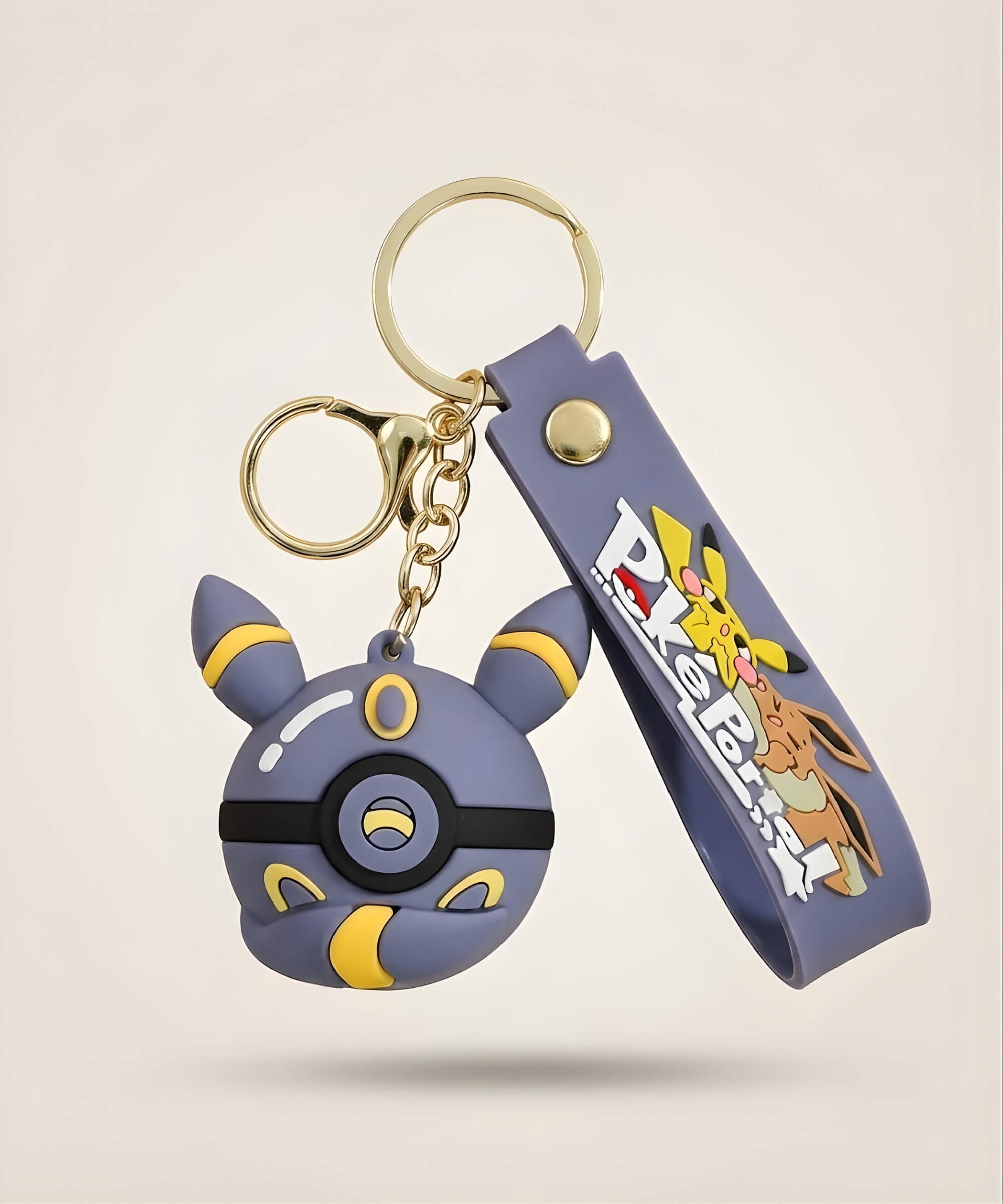 Moon style Poke Ball-inspired strap keychain with dark blue 3D charm, matching strap and gold-tone hardware